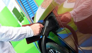 Auto Express creative director Darren Wilson charging the Lexus RZ